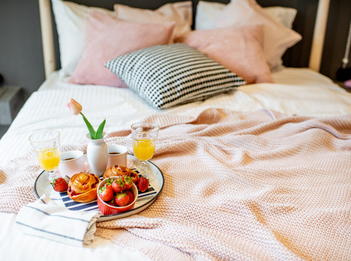 Tasty breakfast on the bed